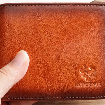 carteira masculina HumerPaul segurada na mao