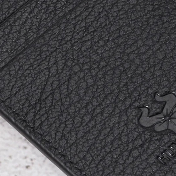 textura do couro preto em carteira masculina HumerPaul